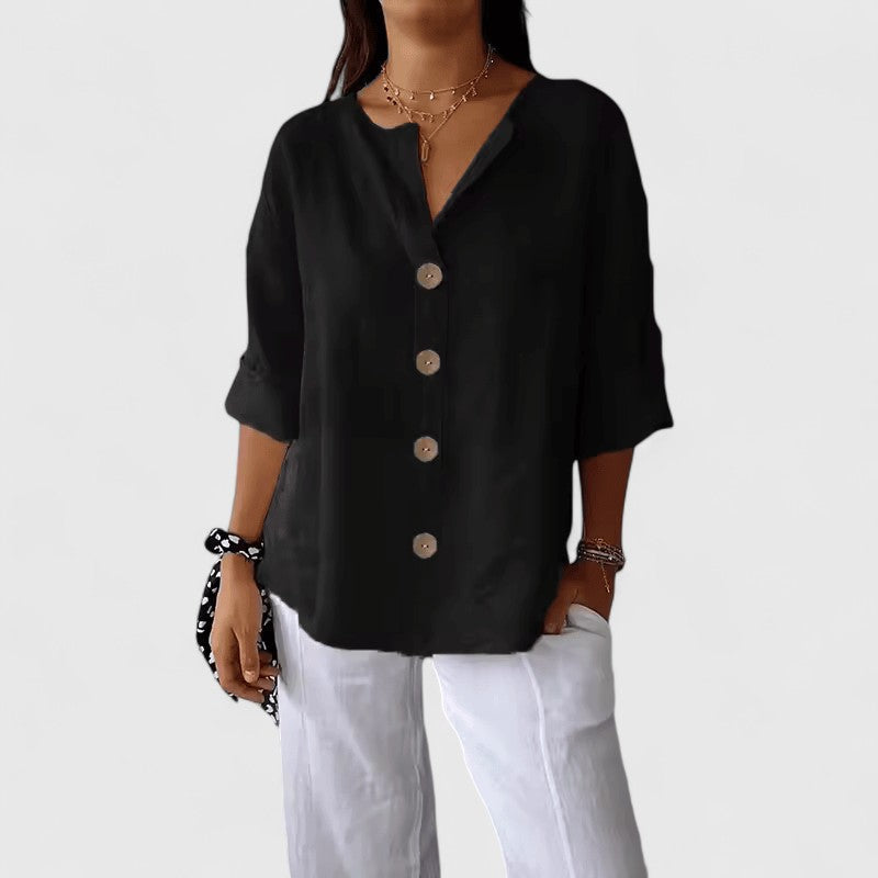 Stylish women's V-neck button-front blouse, an elegant top for versatile spring & summer casual or office wear.