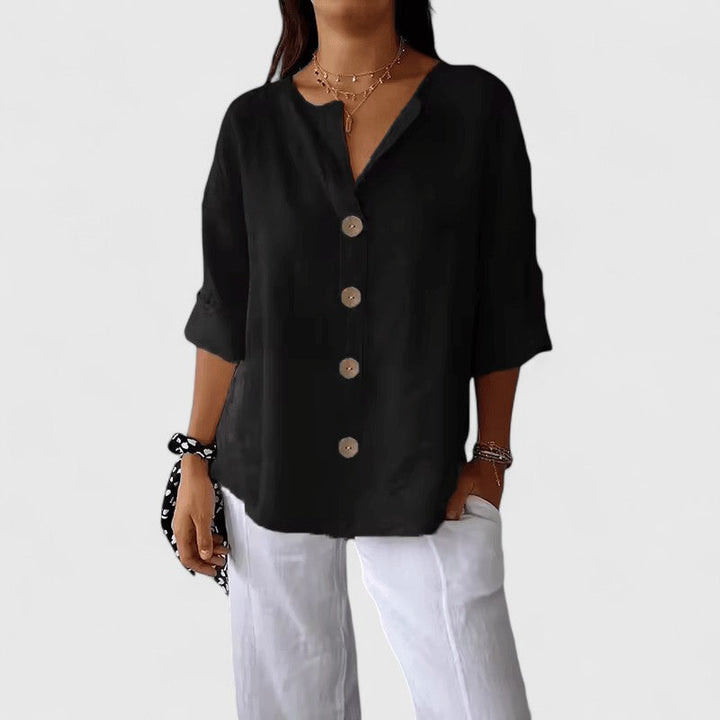 Stylish women's V-neck button-front blouse, an elegant top for versatile spring & summer casual or office wear.