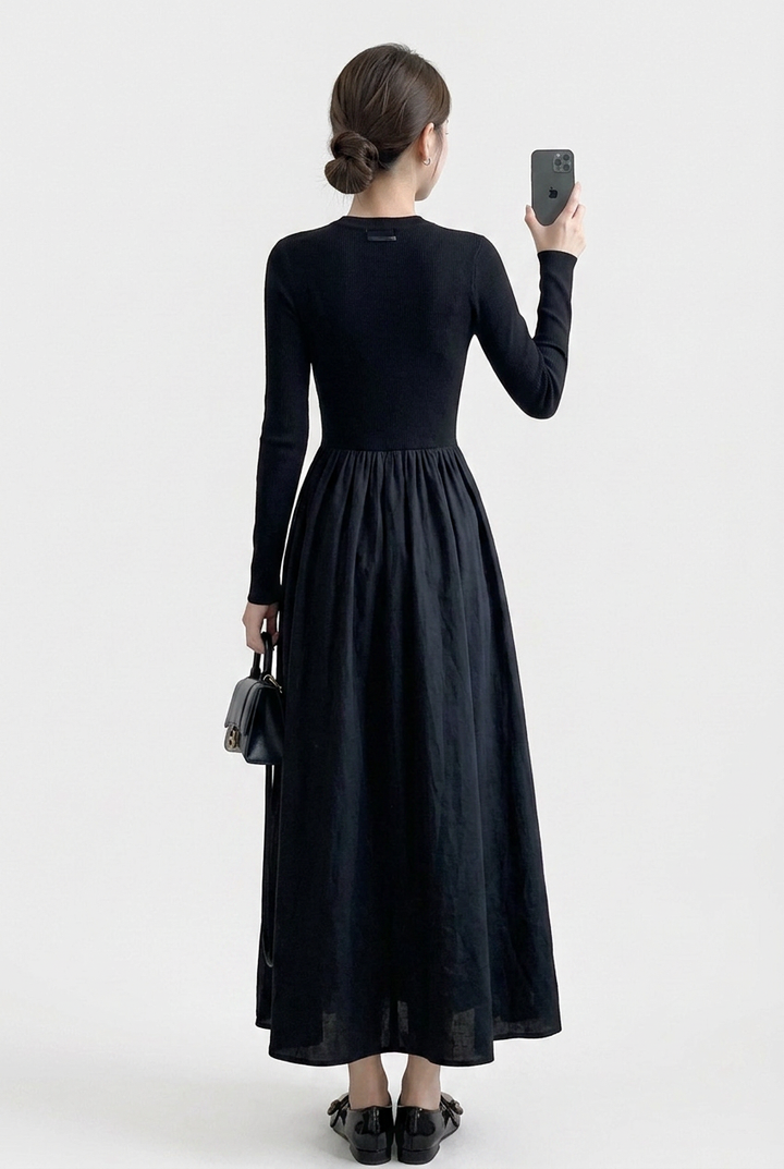 Versatile women's black high neck long sleeve top with matching textured midi A-line skirt set.