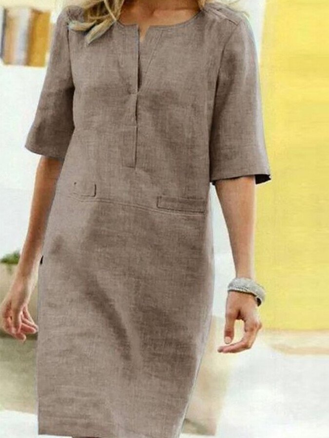 Effortless women's casual shift dress. Relaxed fit, comfortable for all-day wear with convenient pockets.