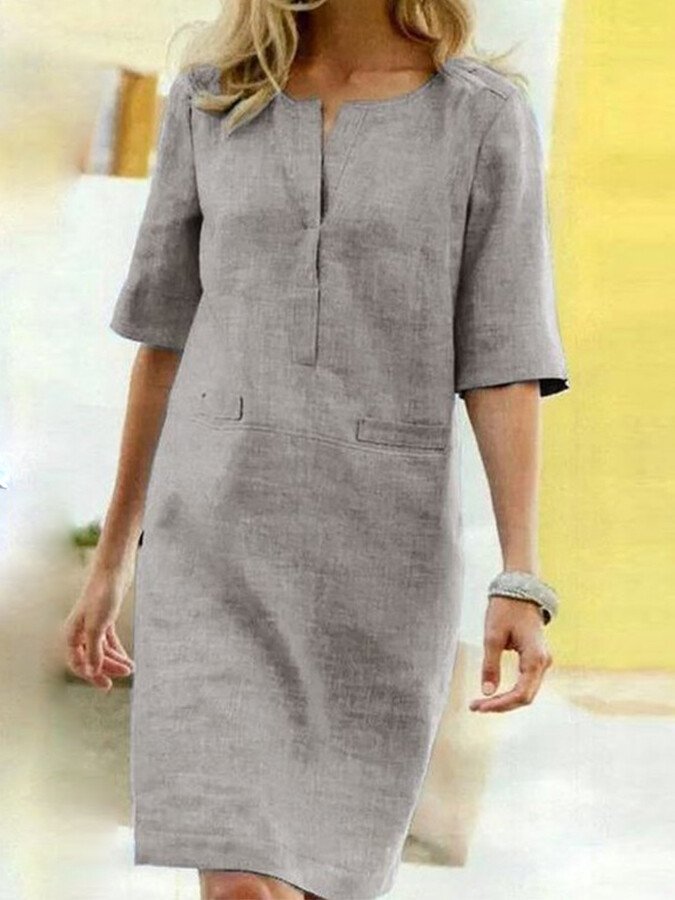 Versatile women's shift dress, ideal for summer. Relaxed fit, easy-wear style with pockets for everyday fashion.