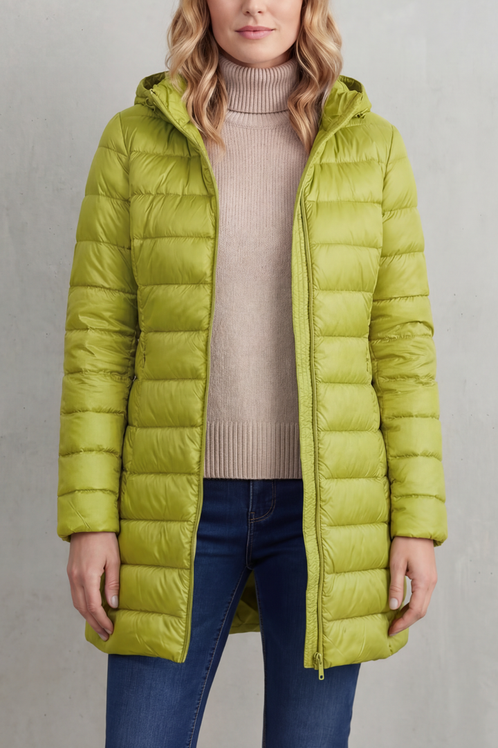 Cozy & stylish women's hooded puffer jacket, an essential lightweight winter coat.