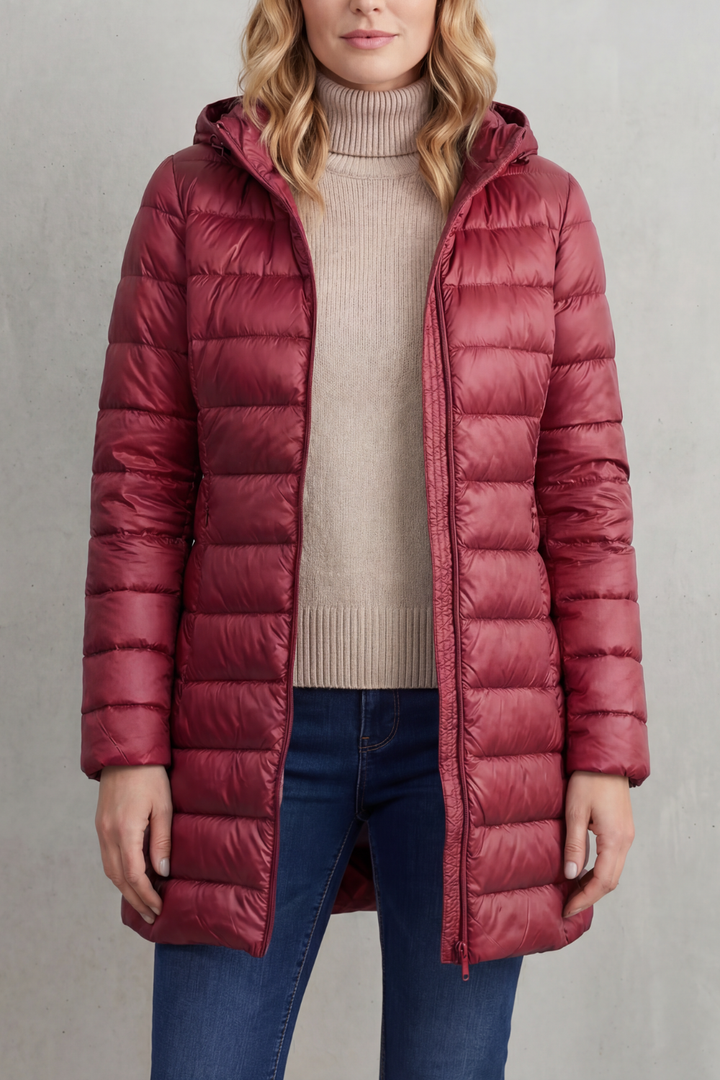 Women's outdoor wear: hooded puffer jacket, offering cozy warmth and sleek style.