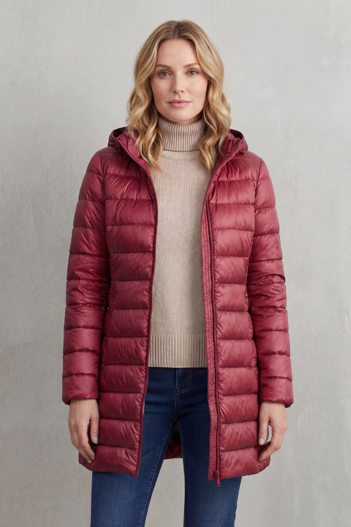 Lightweight women's hooded puffer jacket, a versatile and warm everyday winter coat.