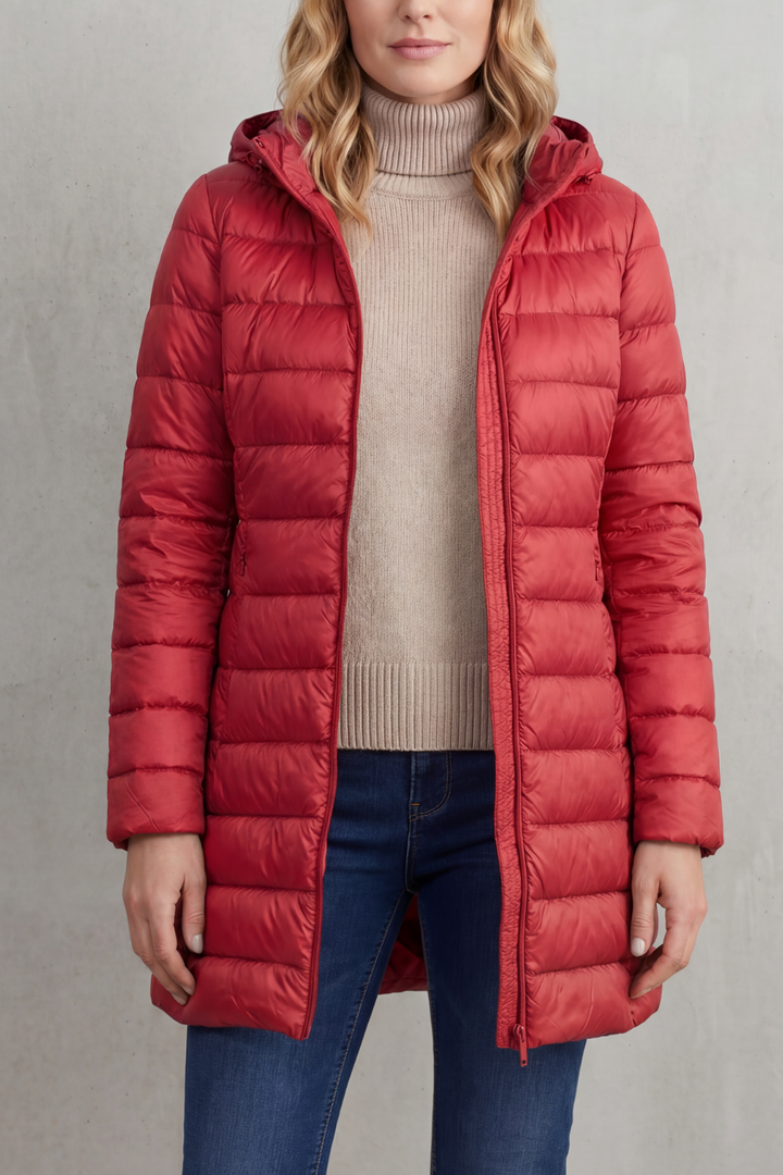Stay warm with this women's ultra-light hooded puffer jacket, ideal for winter outdoor wear.