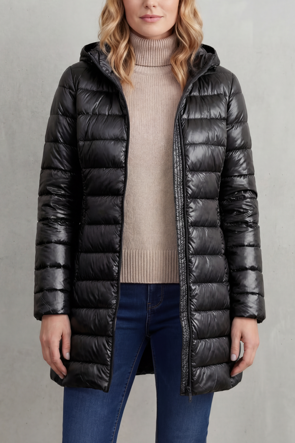Stylish women's lightweight puffer jacket with hood, providing warmth for any occasion.