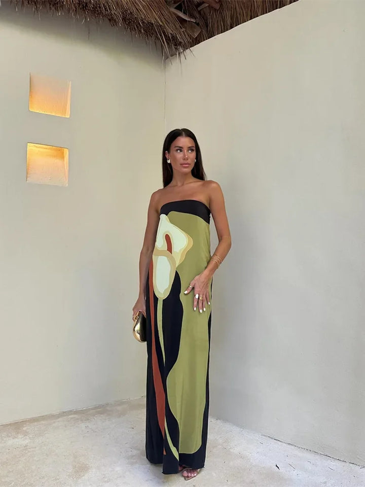 Elegant women's printed strapless maxi dress, perfect for summer occasions & formal events.