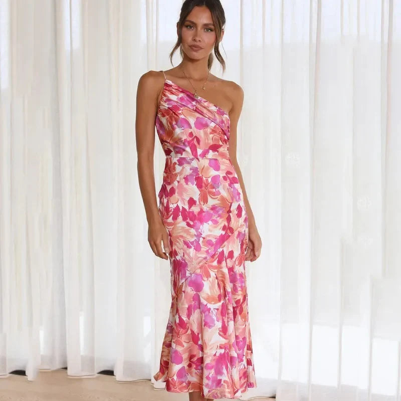 Women's Madison elegant asymmetrical floral midi dress with a flowing skirt. Perfect for summer parties & occasions.
