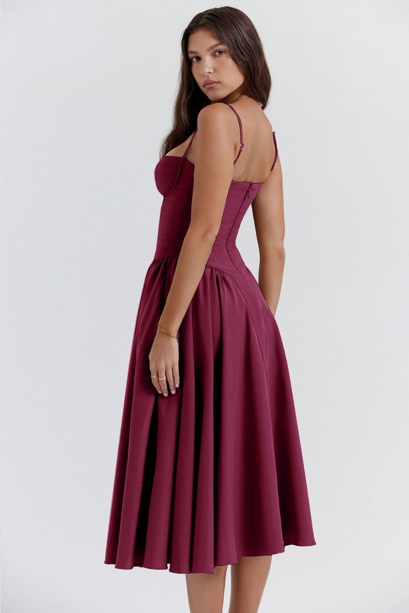 Chic women's sleeveless corset midi dress. Ideal as a wedding guest or formal party outfit.