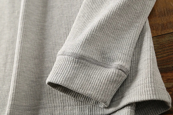 Comfortable men's waffle henley for everyday wear, a breathable long sleeve top for modern style.