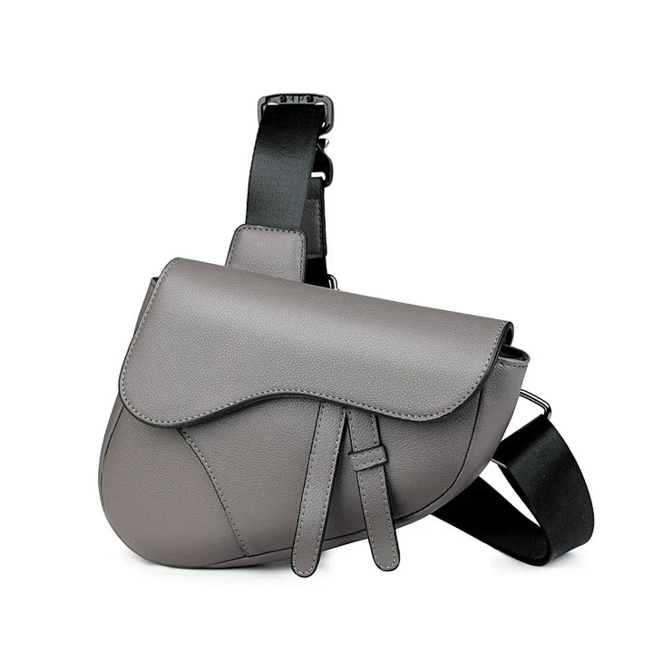 Men's structured minimalist crossbody bag, saddle style, featuring an adjustable shoulder strap.
