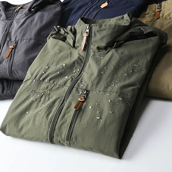 Versatile men's lightweight jacket. Waterproof windbreaker for outdoor, travel, or casual everyday fashion.