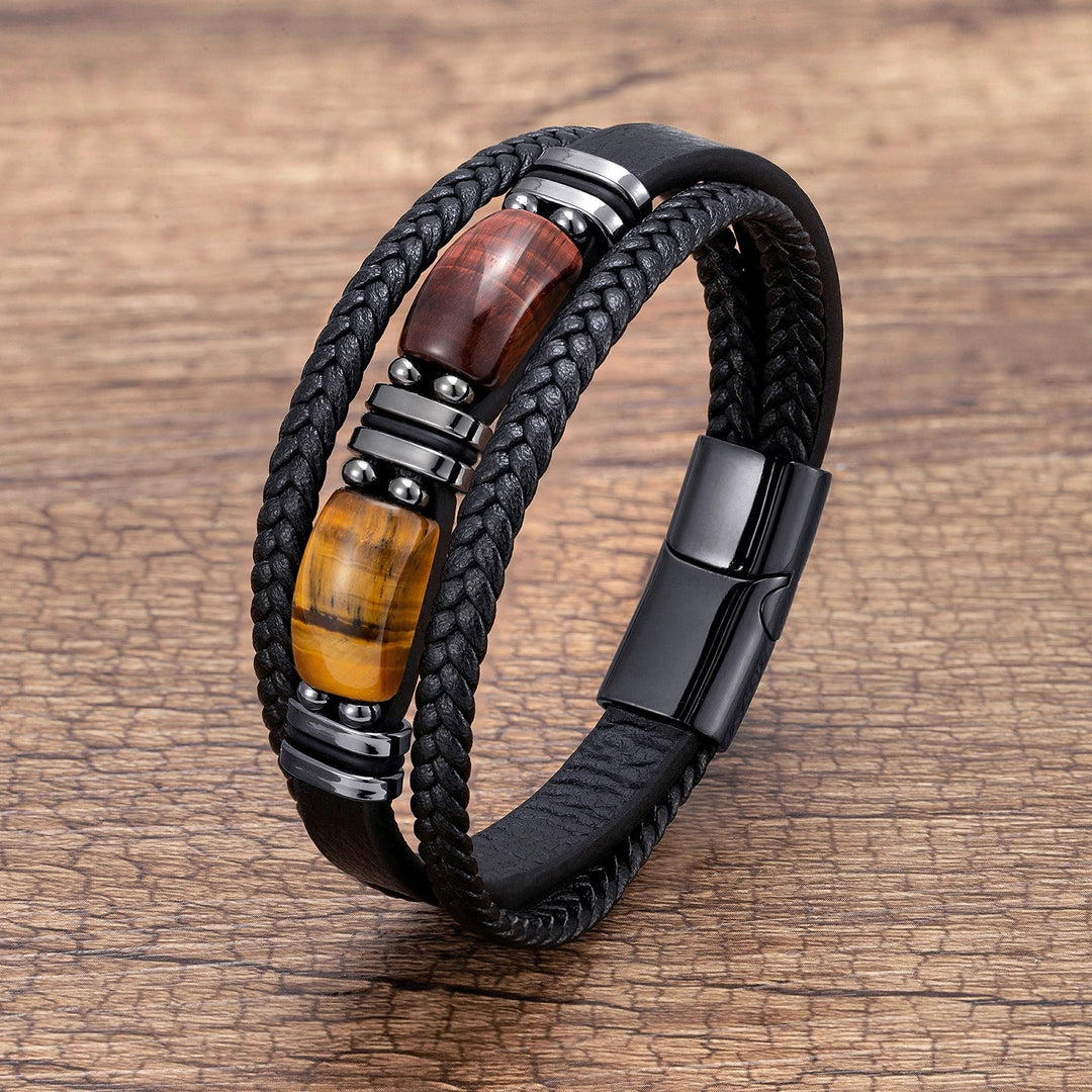 Stylish men's tiger eye bracelet, braided design on wrist for a confident everyday accessory.
