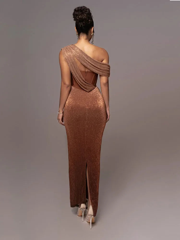 Luxurious statement maxi dress with one shoulder, ideal for a formal evening, wedding guest, or a chic girls' night out.