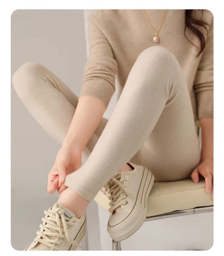 Luxurious women's high waist leggings, ultra-soft cashmere for comfortable winter attire.