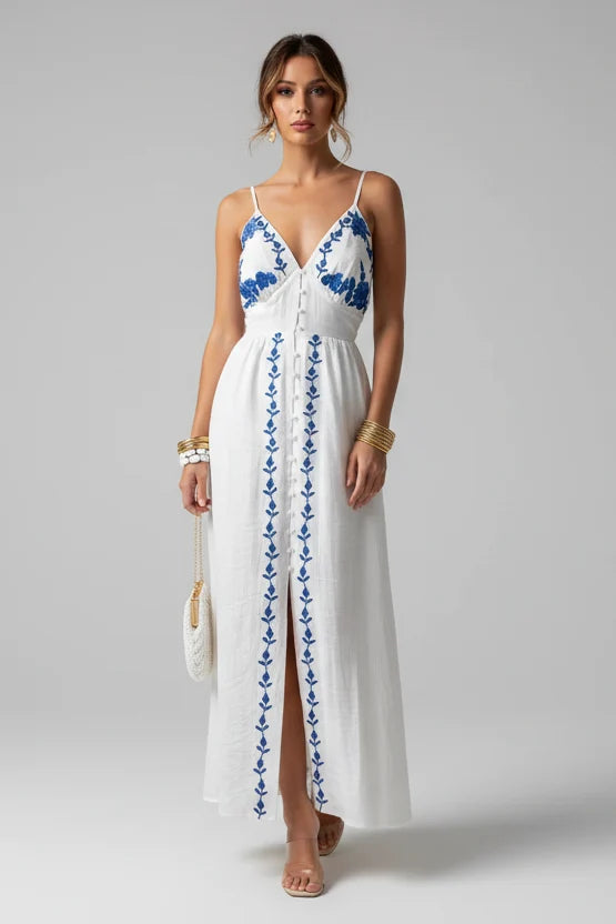 Women's elegant sleeveless spaghetti strap summer dress. Lightweight & versatile for casual or party wear.