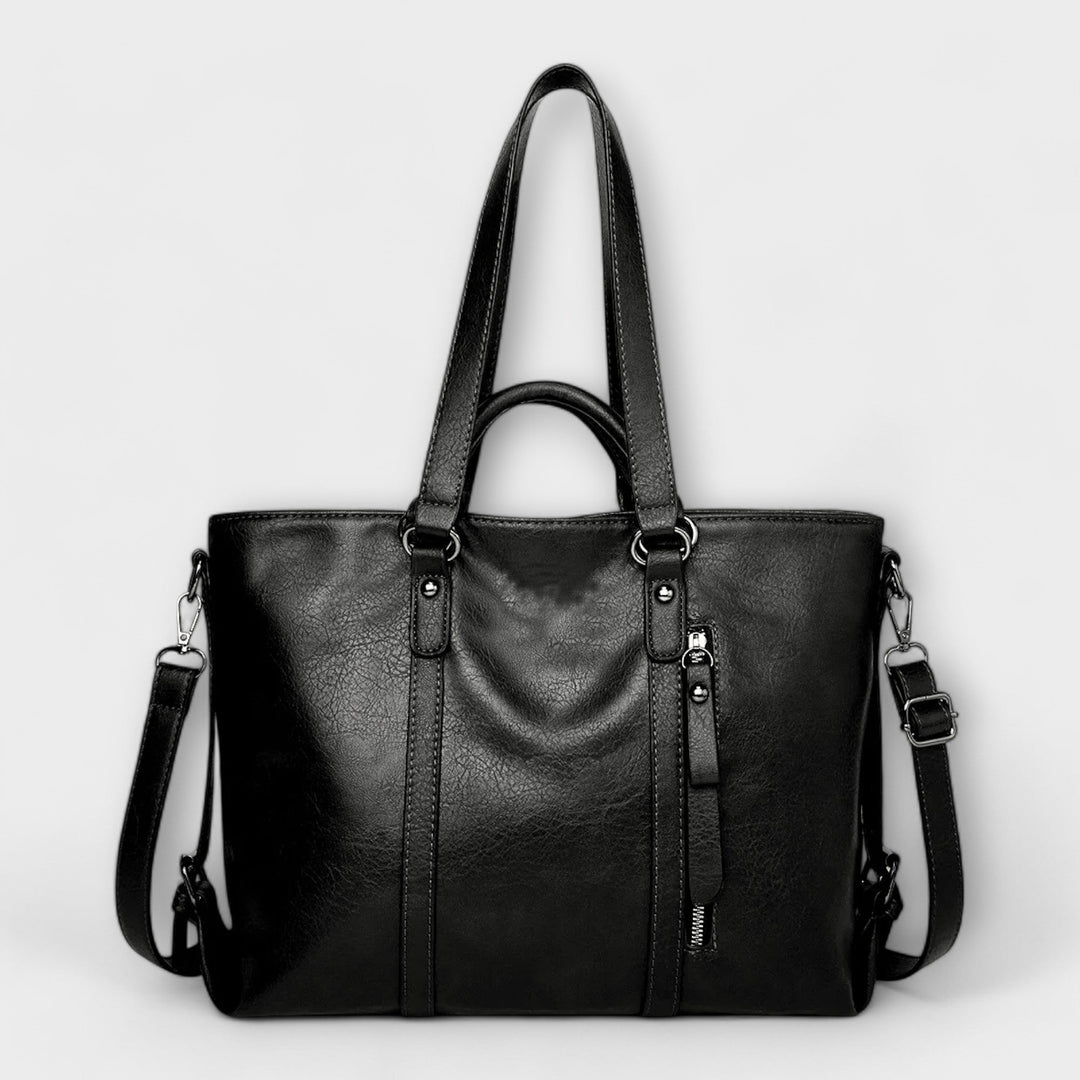 Elegant women's genuine leather handbag with strong straps, a large capacity shoulder bag in tan.