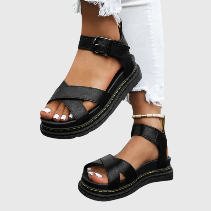 Stylish women's open-toe sandals with cushioned arch support. Comfortable everyday wear for pain relief and foot health.