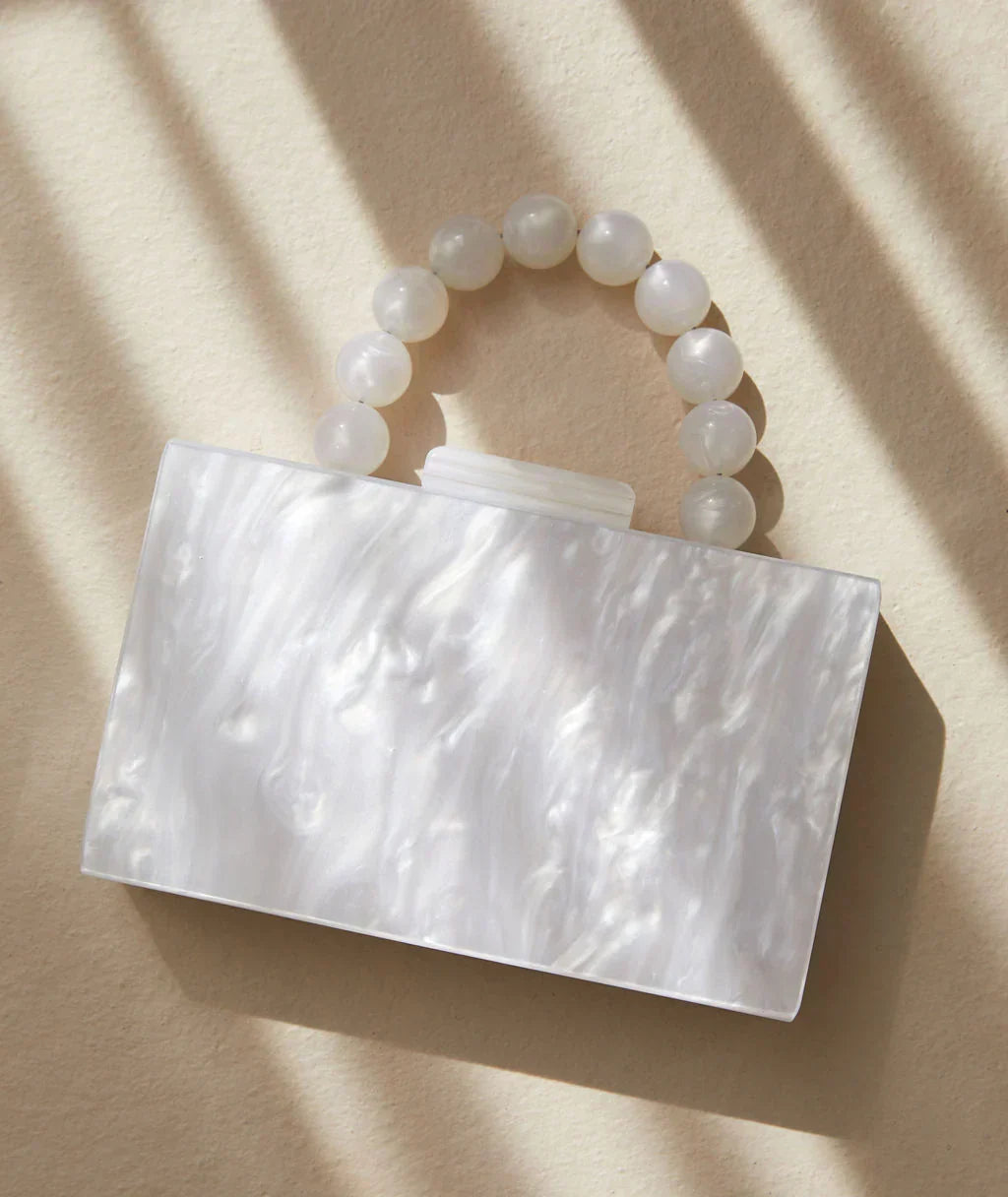 Elegant acrylic clutch bag, women's old money style evening accessory for parties.