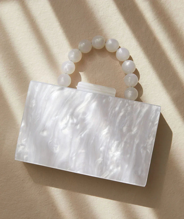 Elegant acrylic clutch bag, women's old money style evening accessory for parties.