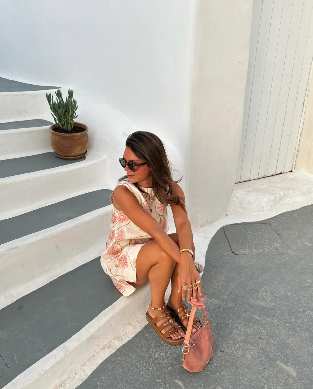 Lightweight women's short printed mini dress, sleeveless, for comfortable summer fashion & vacation outfits.