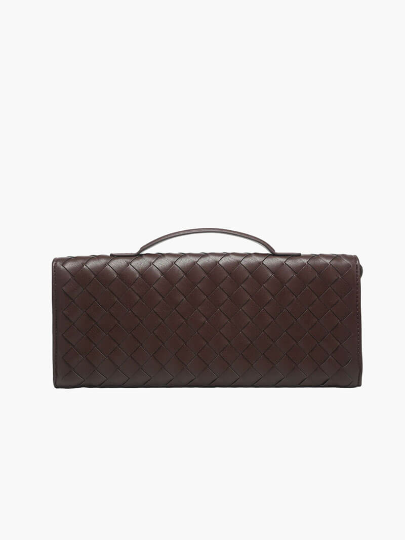 Chic women's accessory: a woven clutch bag with knot closure, perfect for any party.