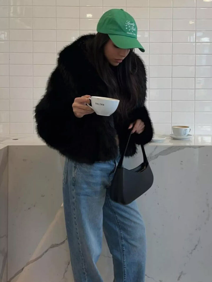 Timeless wide lapel women's jacket, a classic winter coat offering elegance, warmth, and style.
