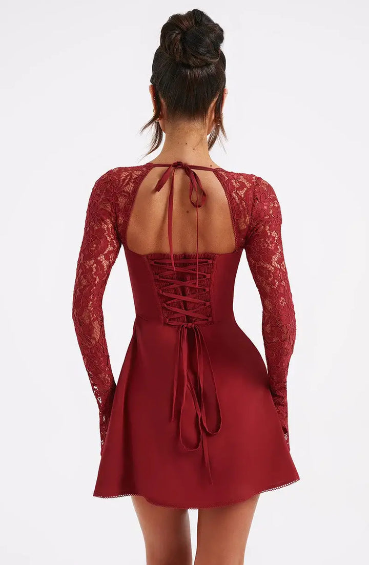 Trendy women's lace sleeve mini party dress, designed with a flattering fit and flare silhouette.