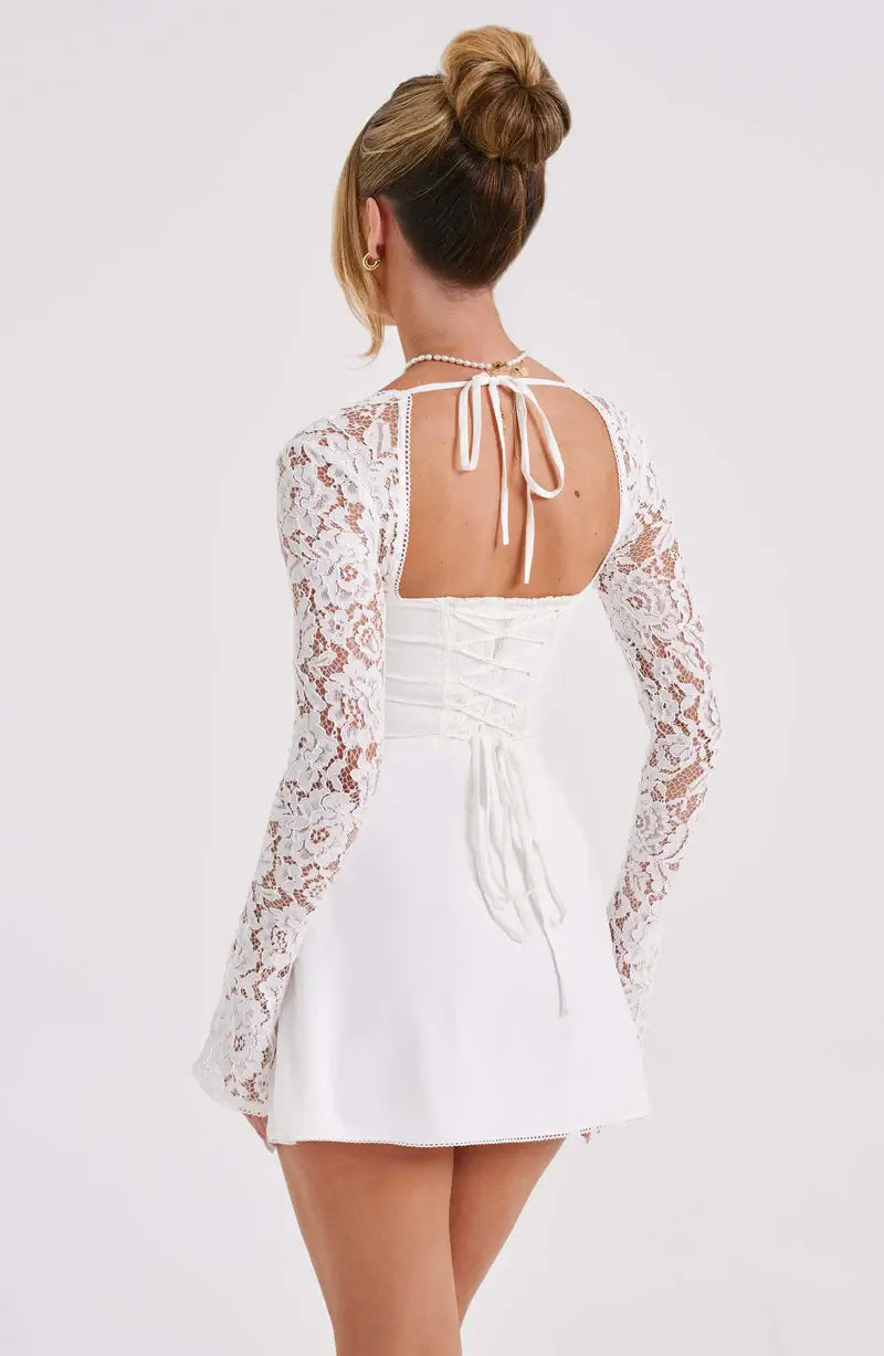 Classic women's mini fit & flare dress with elegant lace sleeves. Ideal for parties and special events.