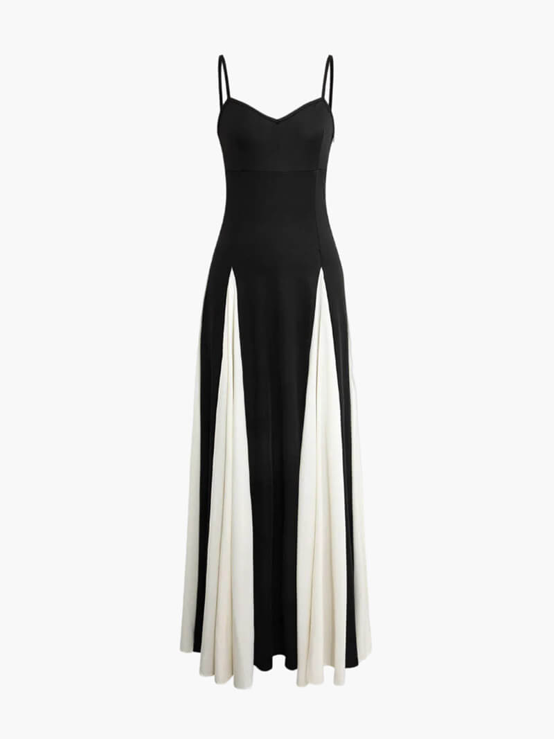 Flowing black and white asymmetrical maxi dress for women, ideal for parties & elegant events.