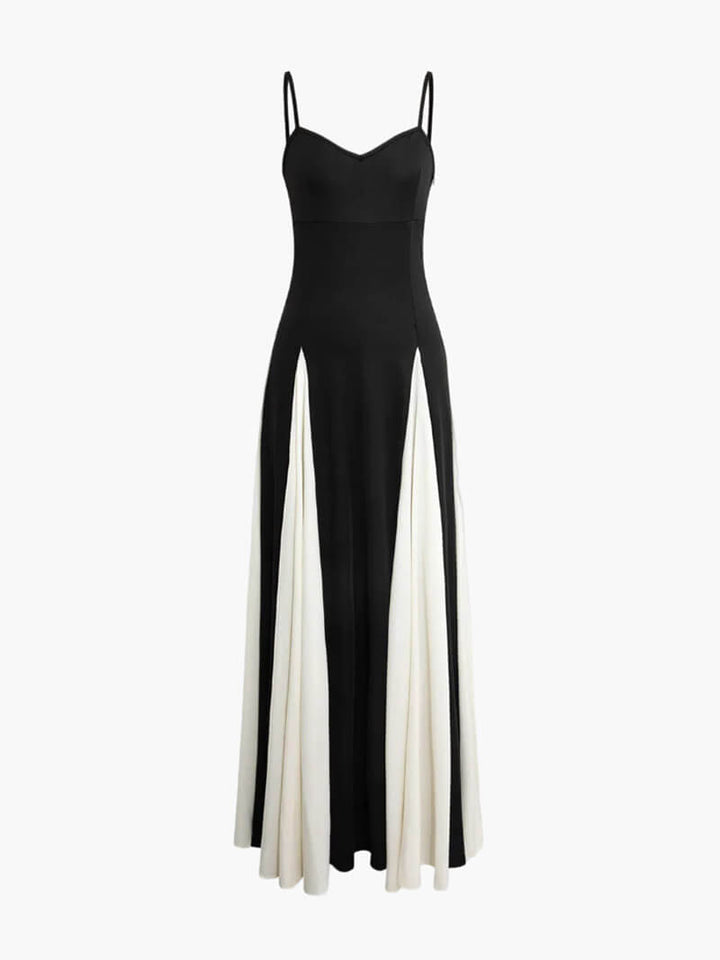 Flowing black and white asymmetrical maxi dress for women, ideal for parties & elegant events.