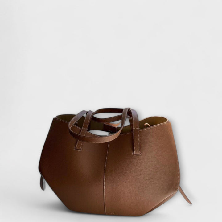 Beautiful elegant vintage leather tote bag, a women's chic daily shoulder handbag with vintage charm.