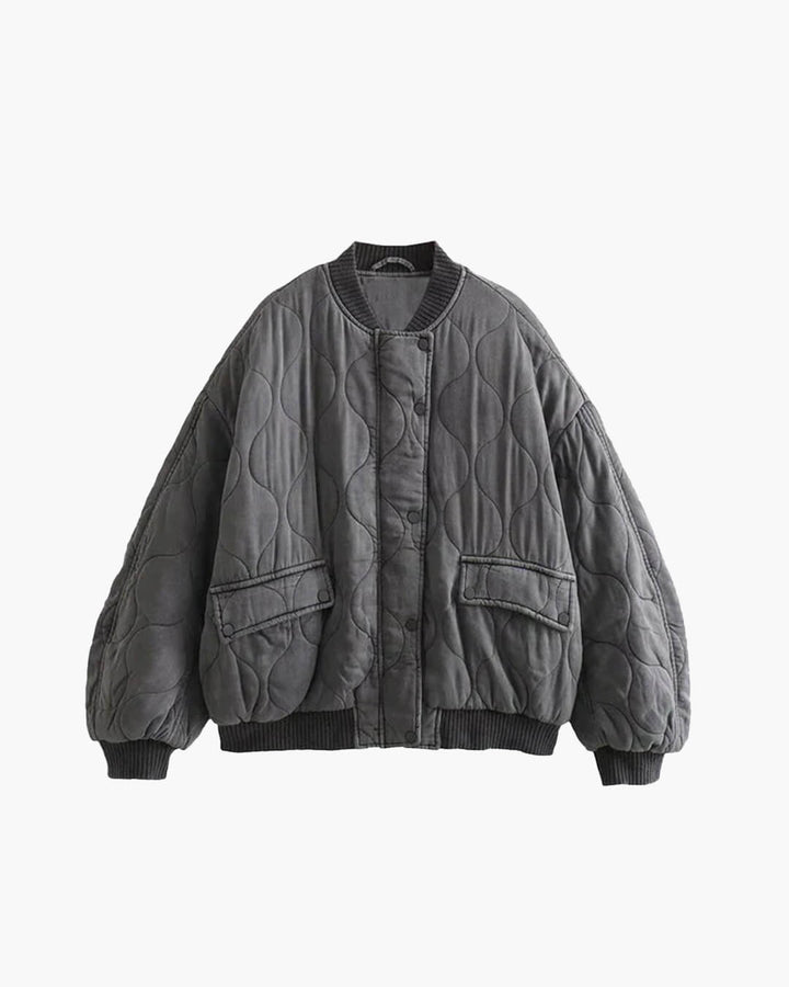 Women's oversized quilted bomber jacket in grey, perfect for streetwear and casual fall fashion.
