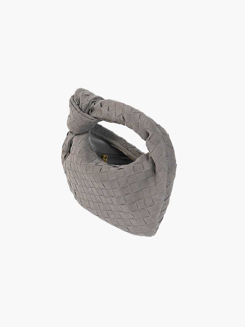 Everyday elegant braided suede mini bag designed for the modern woman.