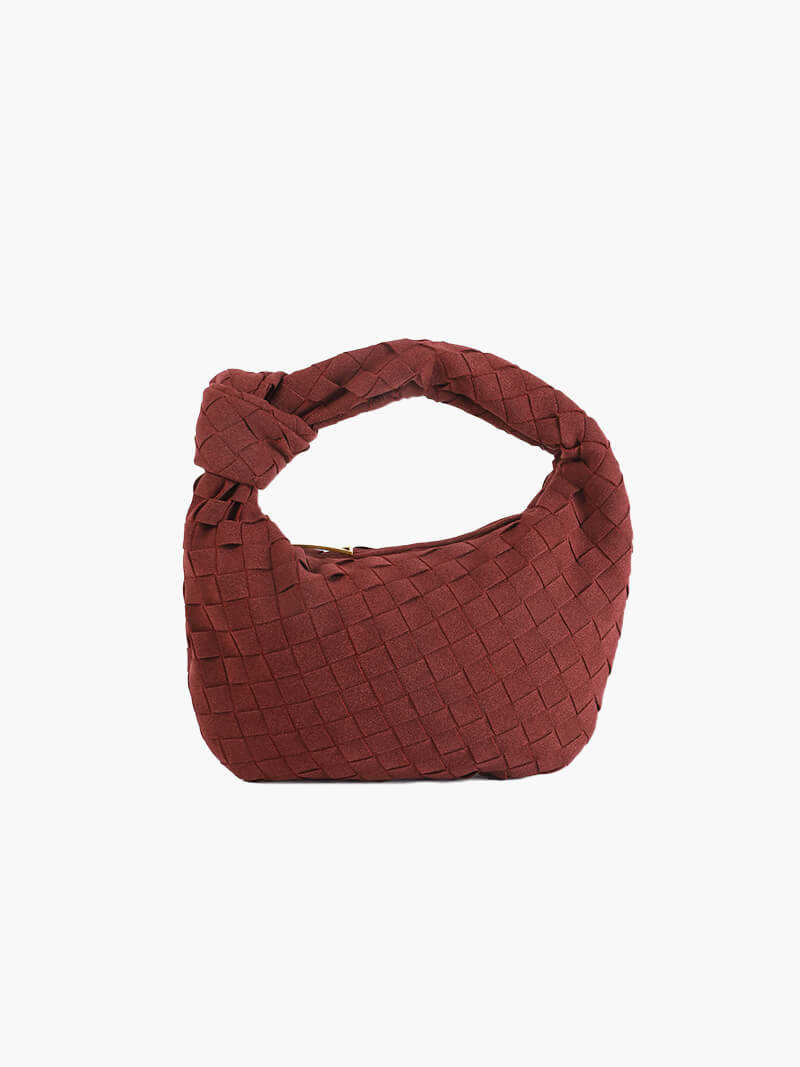 Fashionable mini suede bag for women, featuring a chic braided strap.