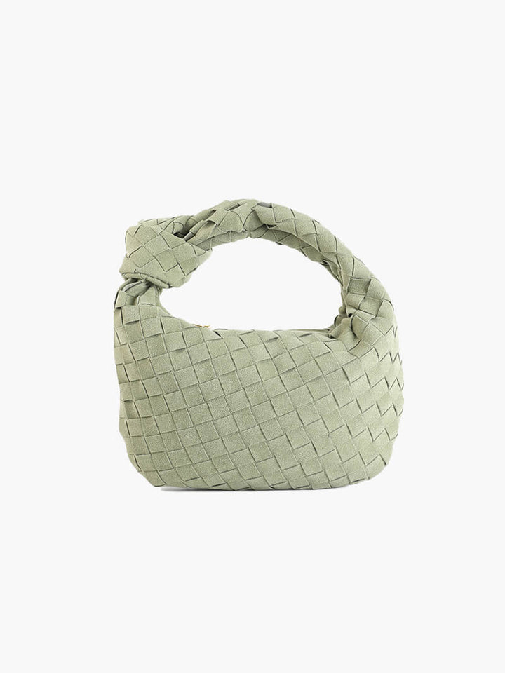 Women's elegant braided suede shoulder bag, both compact and chic.