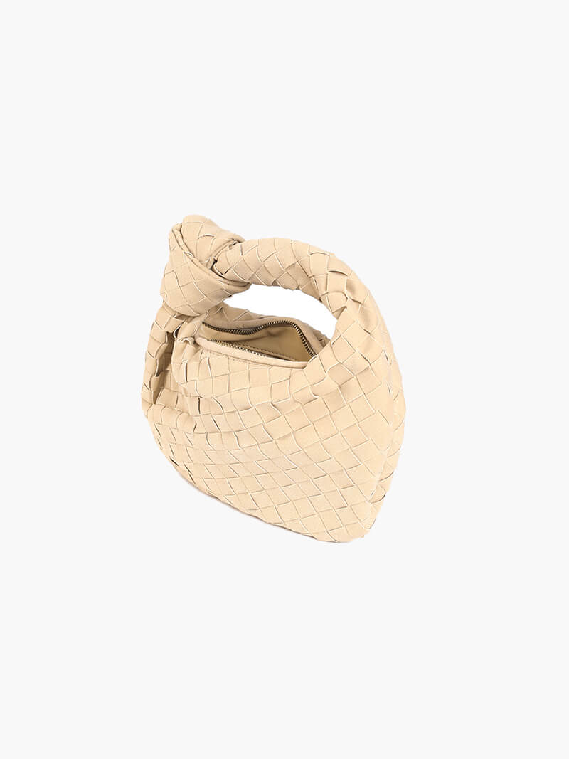 Sophisticated mini bag with a unique braided suede texture for women.