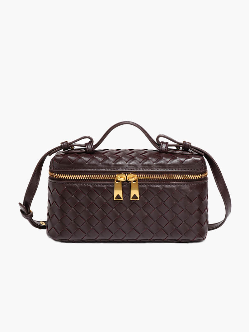 Elegant women's compact woven bag, featuring a subtle texture and practical shoulder strap.