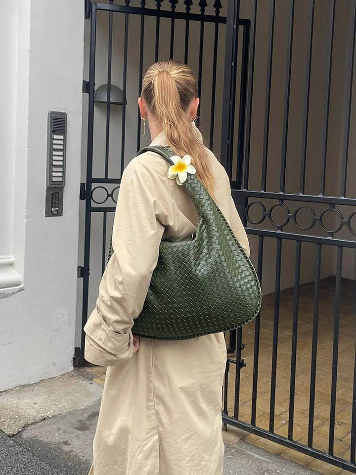 Premium vegan leather shoulder bag for women, featuring a beautiful woven texture.