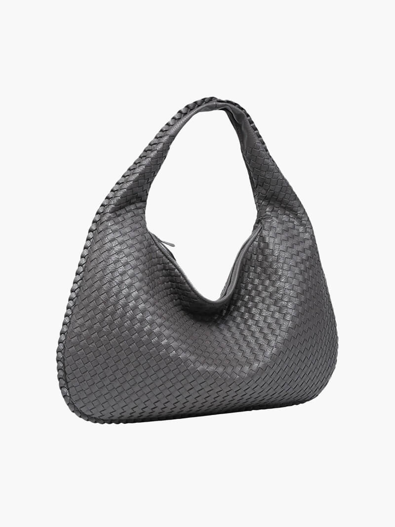 Stylish woven shoulder bag, perfect for women seeking an elegant and spacious vegan leather handbag.