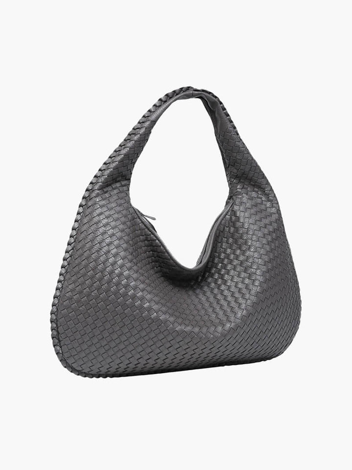 Stylish woven shoulder bag, perfect for women seeking an elegant and spacious vegan leather handbag.