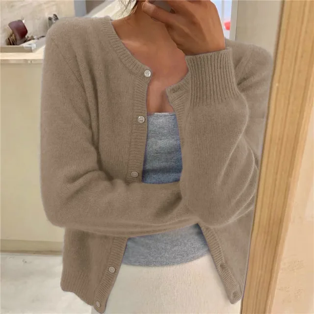 Soft & cozy fluffy women's cardigan. Round neck, button front, perfect for casual layering and fall fashion.