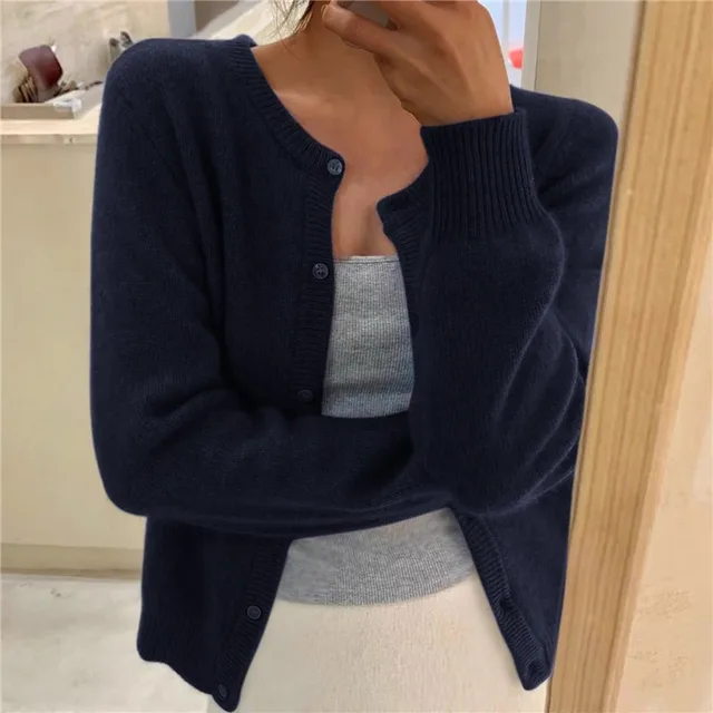 Warm winter style fluffy women's cardigan. Soft, cozy round neck with button front, perfect for everyday fashion.