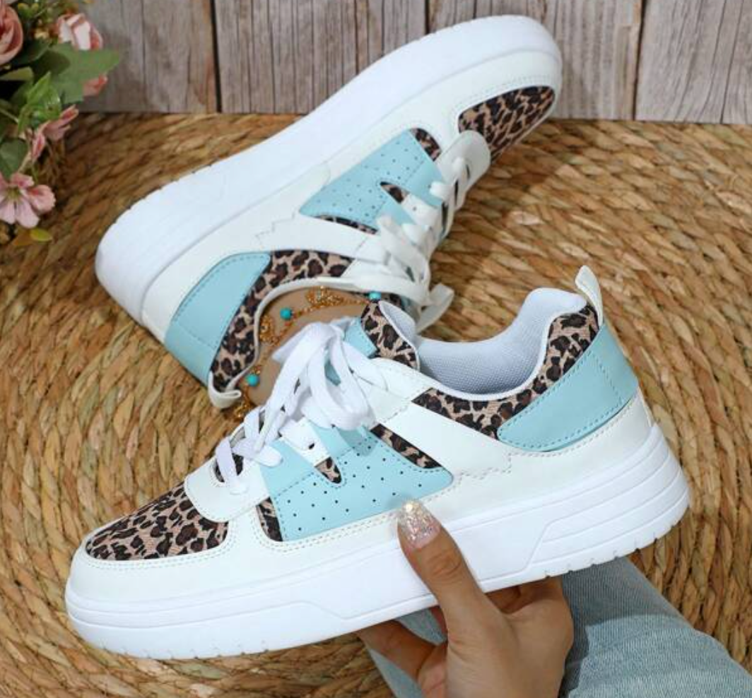 Colorful patterned women's sneakers, blending casual style with fashionable everyday footwear.