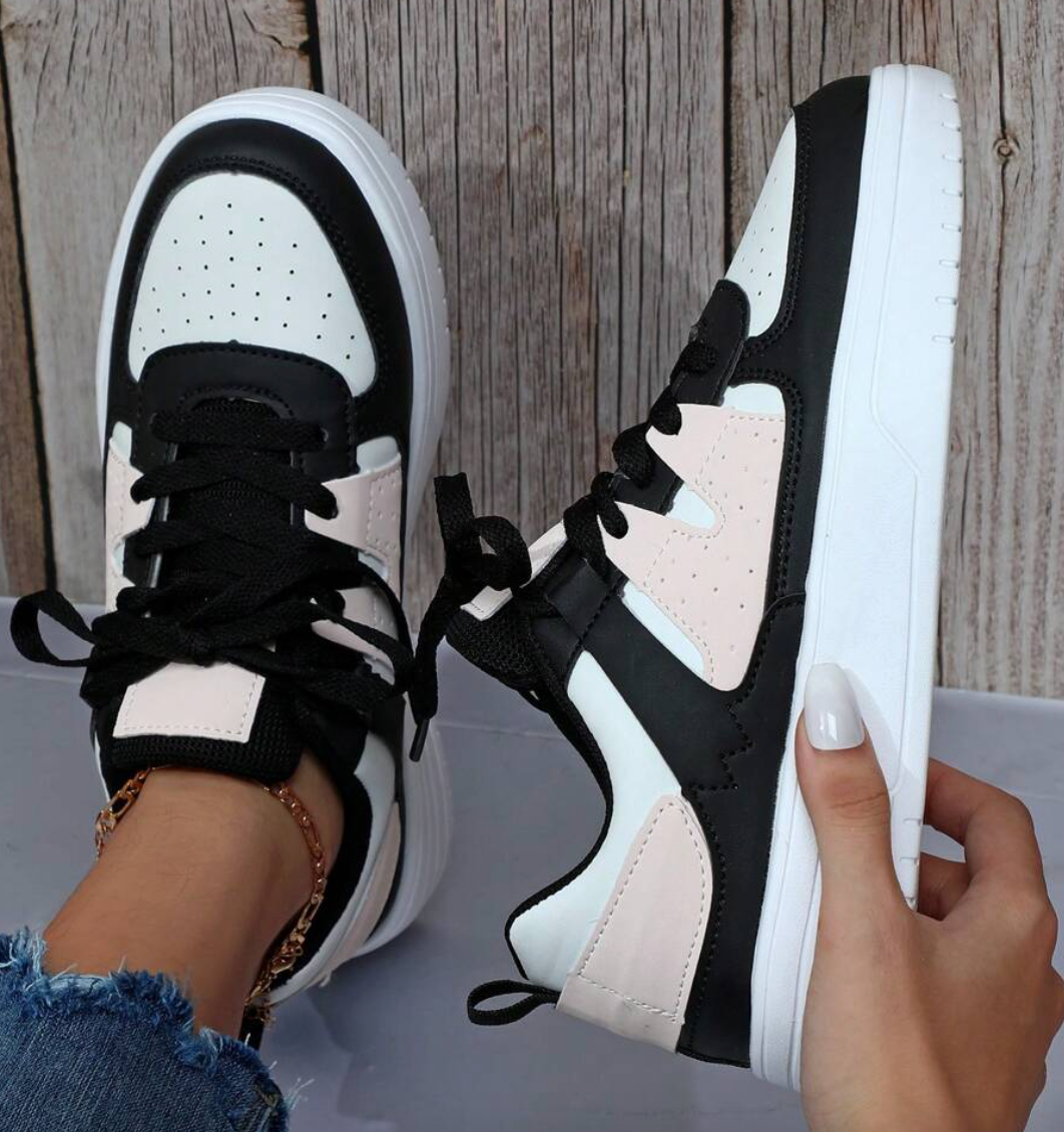 Women's stylish sneakers with vibrant mixed patterns, offering comfort and modern everyday style.