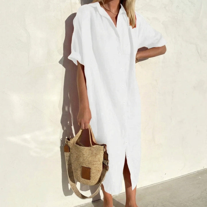 Casual women's midi shirt dress, oversized fit, short sleeve, button front. Versatile for all seasons.