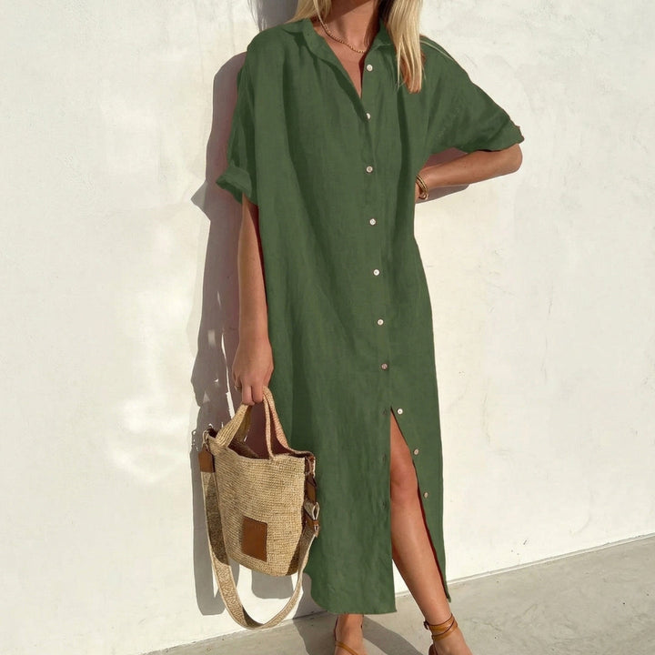 Relaxed fit women's midi shirt dress. Oversized and comfortable, a versatile button-front piece for any season.