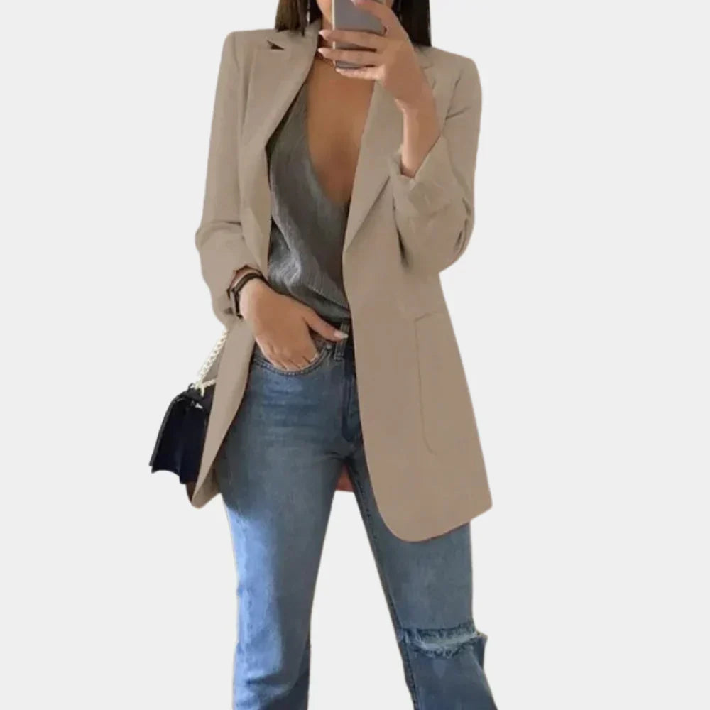 Back view of a women's slim fit tailored longline blazer, ideal for elegant professional & spring fashion.