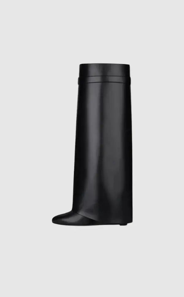 Women's glossy black sculptural wedge knee-high boots for a bold fashion statement.