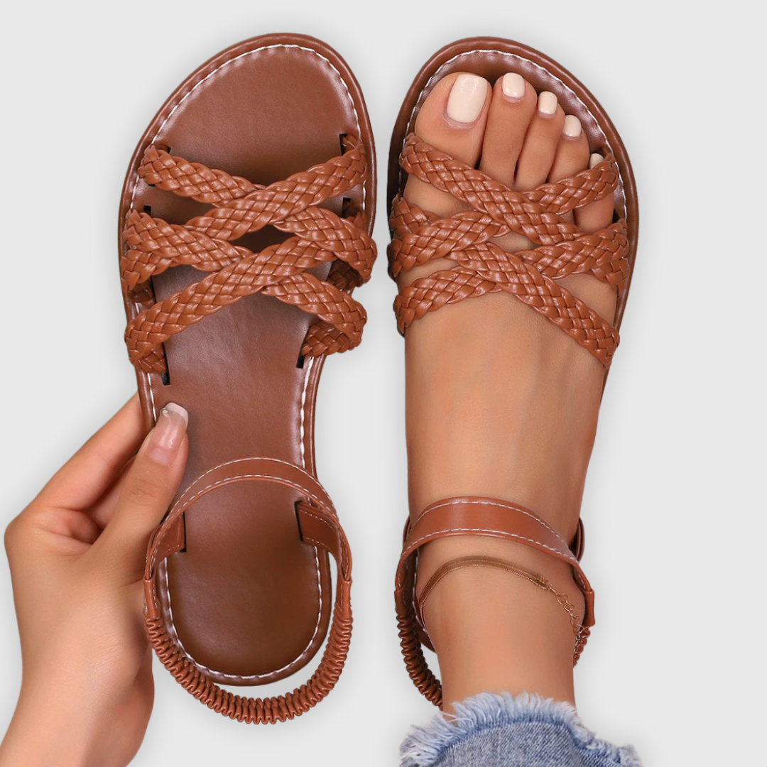 Close-up of chic unisex summer sandals with adjustable straps, perfect for comfortable beachwear.